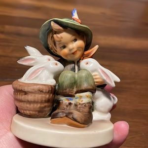 EasterHummel MINT precious little boy playing with his bunnies in their basket.